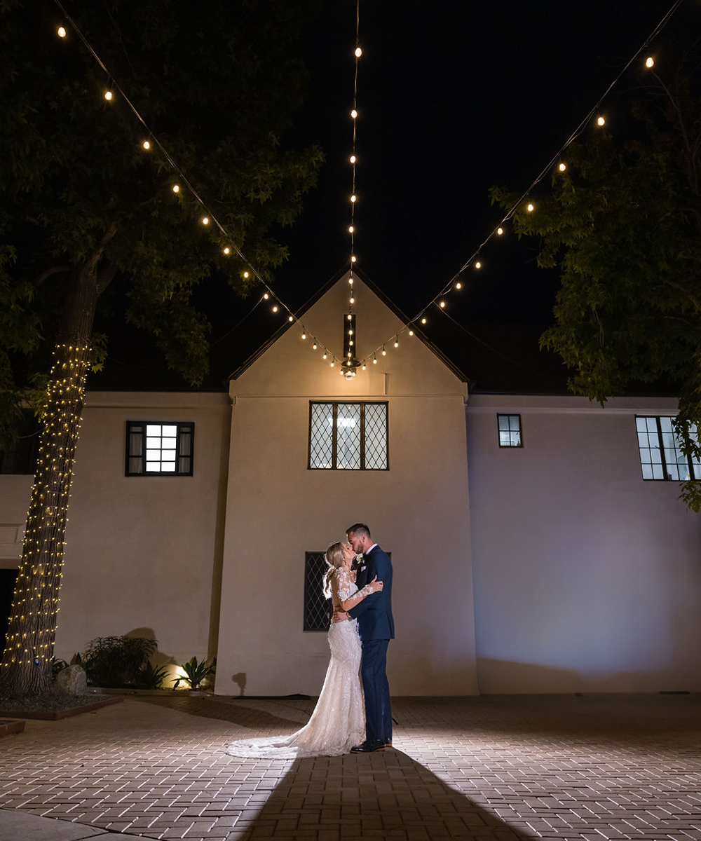 Couple outside, nighttime shot - The Sanctuary by Wedgewood Weddings