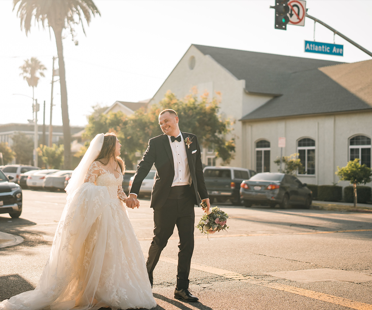 Couple walking down the street - The Sanctuary by Wedgewood Weddings