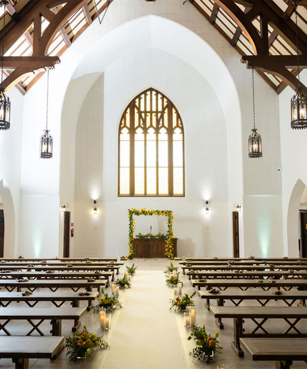 Indoor ceremony with spring flowers - The Sanctuary by Wedgewood Weddings