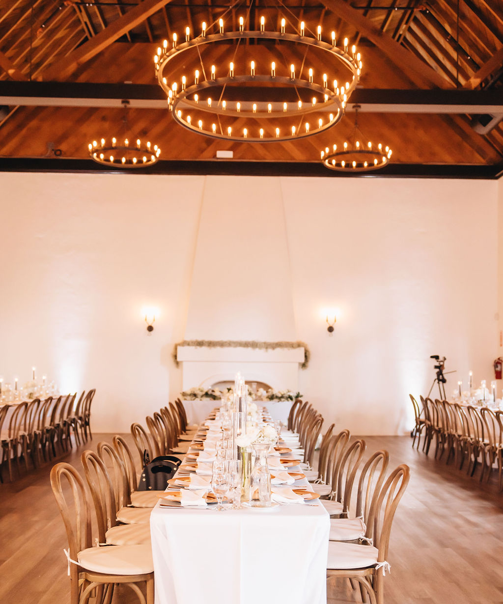 Reception with long tables - The Sanctuary by Wedgewood Weddings