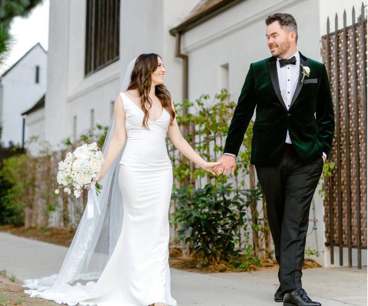 Recently married couple with the Sanctuary behind them