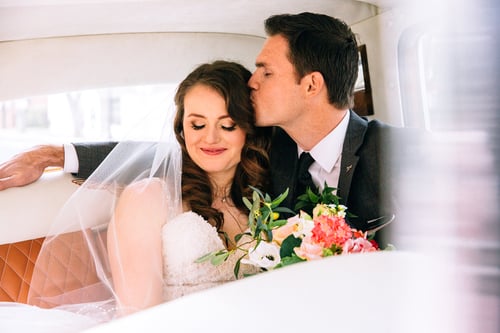 Groom Kissing Bride at Wedgewood Weddings