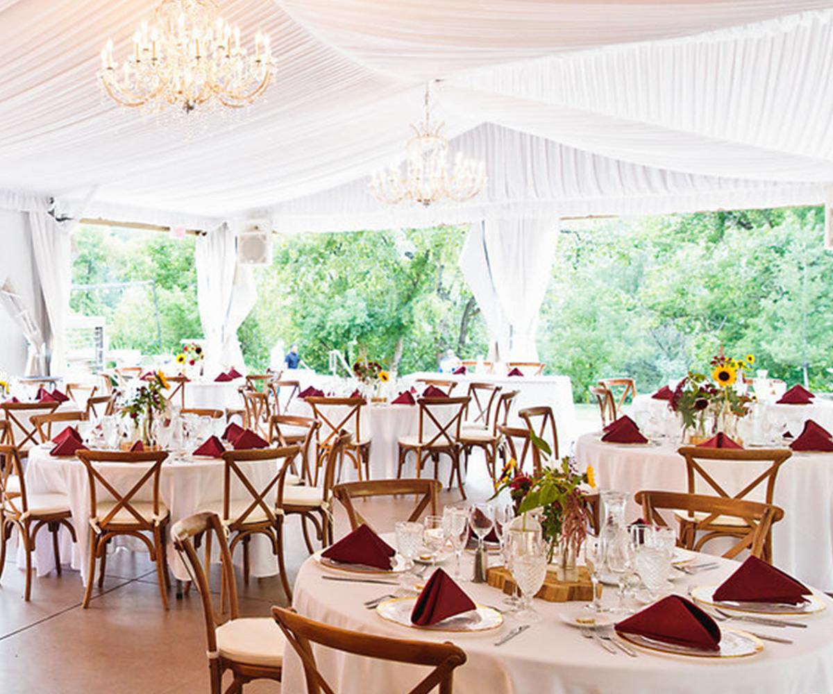 Spacious Wedding Pavilion at Boulder Creek, Colorado, with Classic Table linens and Elegant Décor