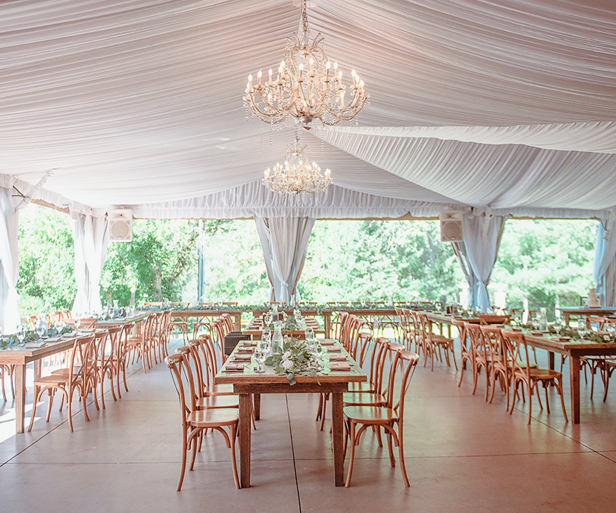 Rustic and Elegant Interior of Boulder Creek Wedding Pavilion in Colorado with Unique Lighting and Natural Backdrop