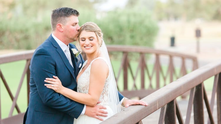 Hunter & Courtney Pose On The Romantic Bridge Over The Waterfall