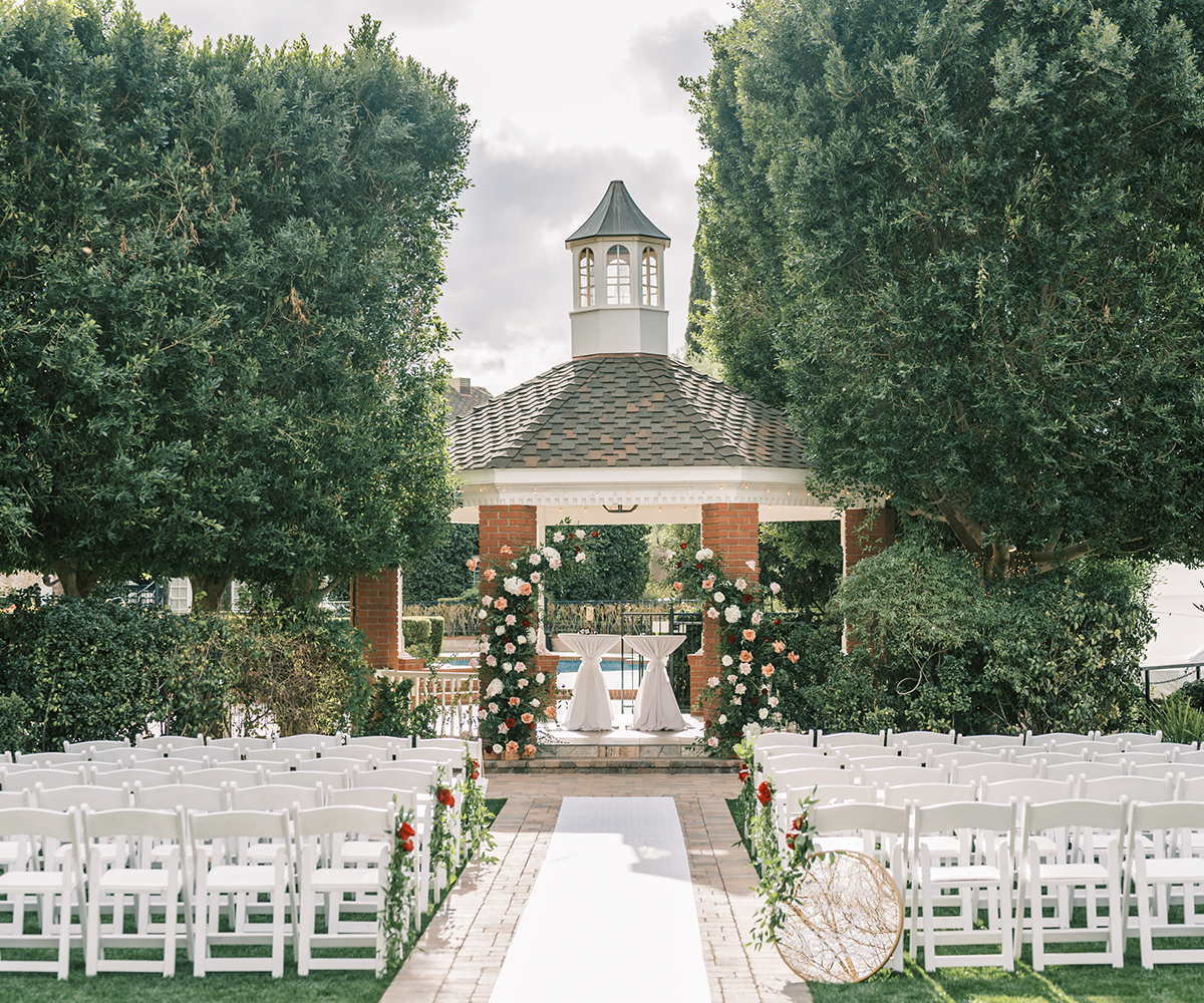 Gazebo ceremony at Stonebridge Manor, lots of florals