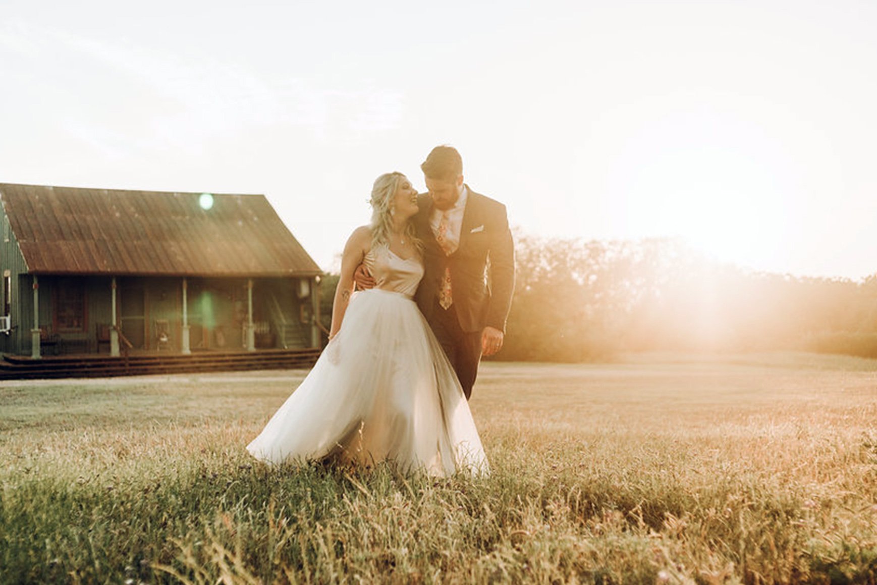 Newlyweds outside of Hofmann Ranch in Castroville, TX