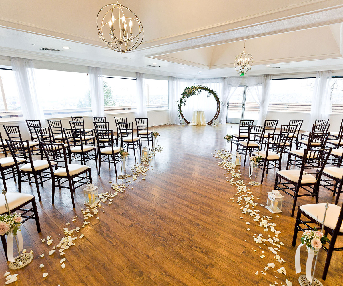 Indoor ceremony with arch - Brittany Hill by Wedgewood Weddings