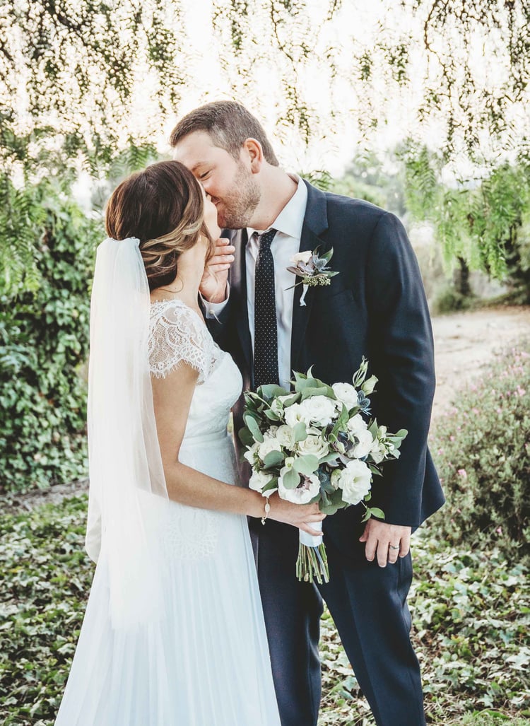 Jamie & Cody share a sweet moment in the gardens of The Carlsbad Windmill estate 