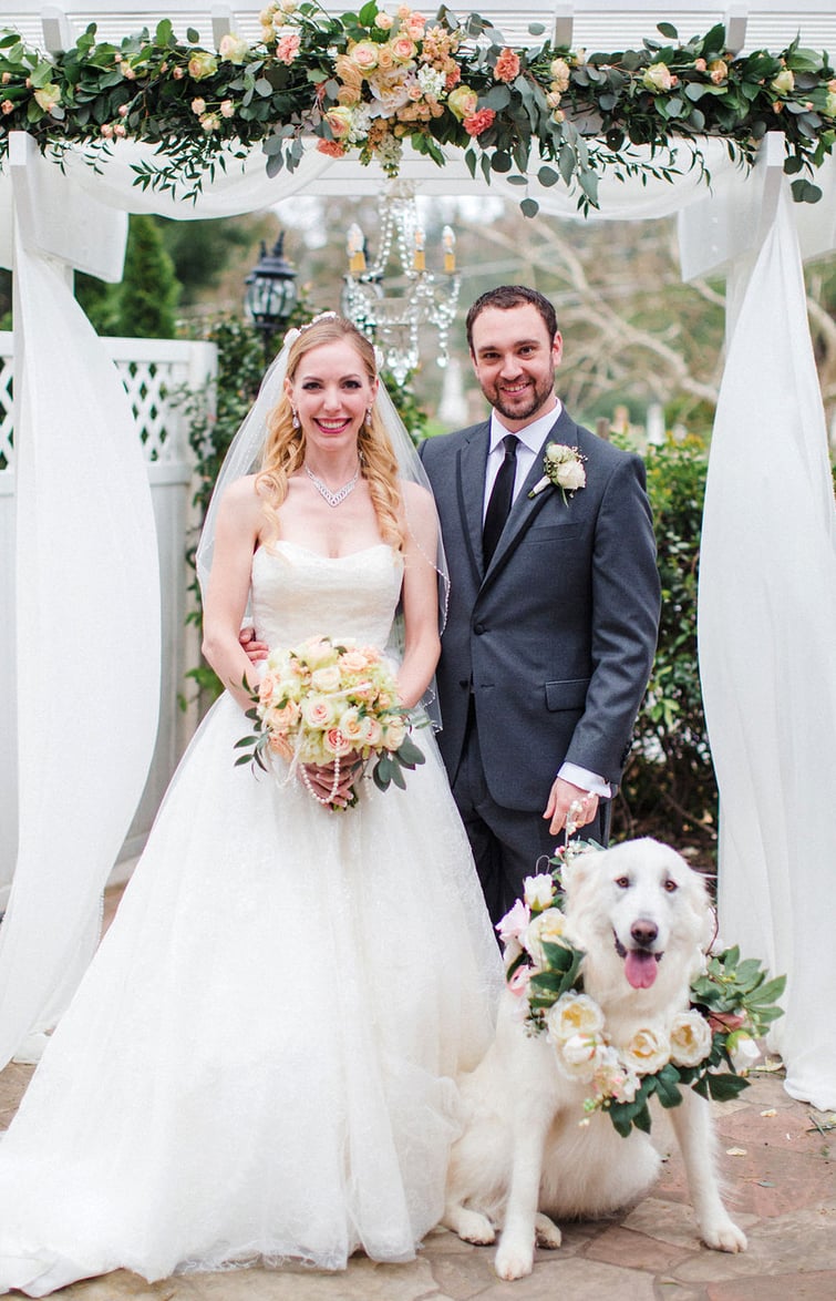 Julie and Vince pose for a family portrait with their pup - Sequoia Mansion by Wedgewood Weddings