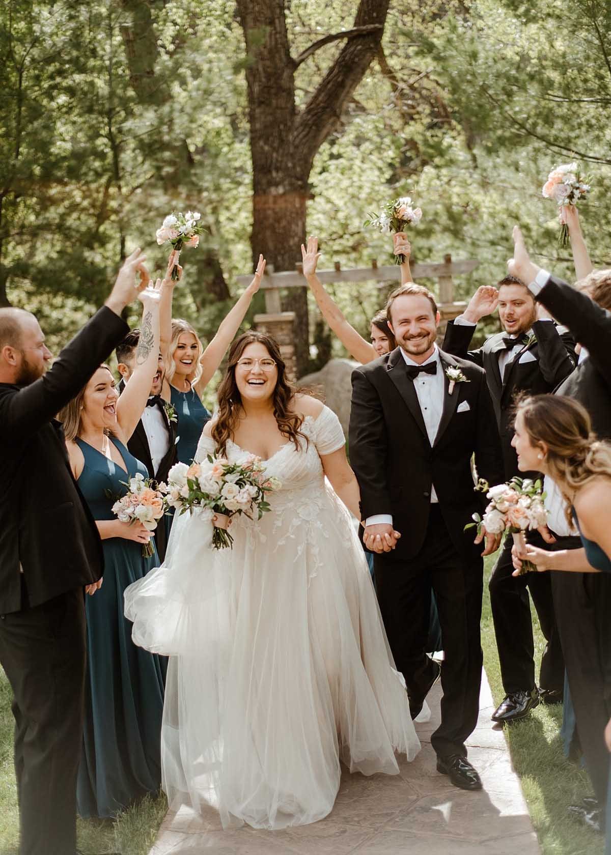 What do you envision when you imagine a romantic celebration of love in the woods alongside a babbling creek? Chances are it'll look something like this beautiful wedding at Boulder Creek by Wedgewood Weddings. Think secret-garden vibes, romantic nature-inspired color palette, lavish greenery, roses, and wandering wildlife. Oh, and dinosaurs! Join us for a virtual tour of Katie and Robert's wedding story . . .