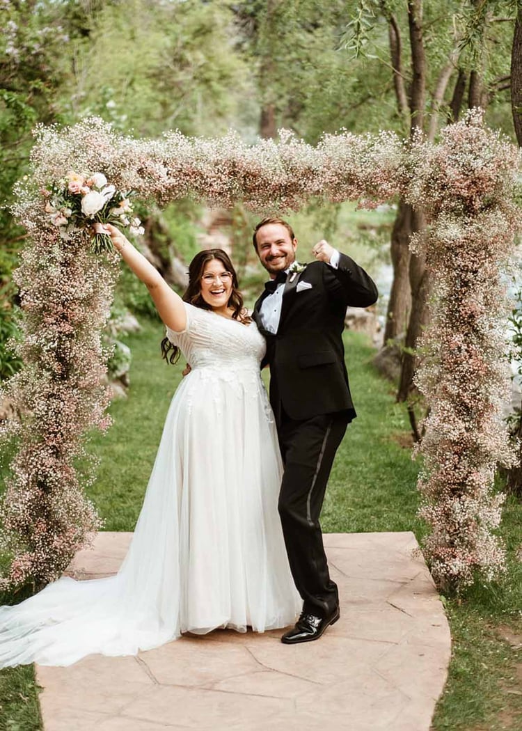 What do you envision when you imagine a romantic celebration of love in the woods alongside a babbling creek? Chances are it'll look something like this beautiful wedding at Boulder Creek by Wedgewood Weddings. Think secret-garden vibes, romantic nature-inspired color palette, lavish greenery, roses, and wandering wildlife. Oh, and dinosaurs! Join us for a virtual tour of Katie and Robert's wedding story . . .