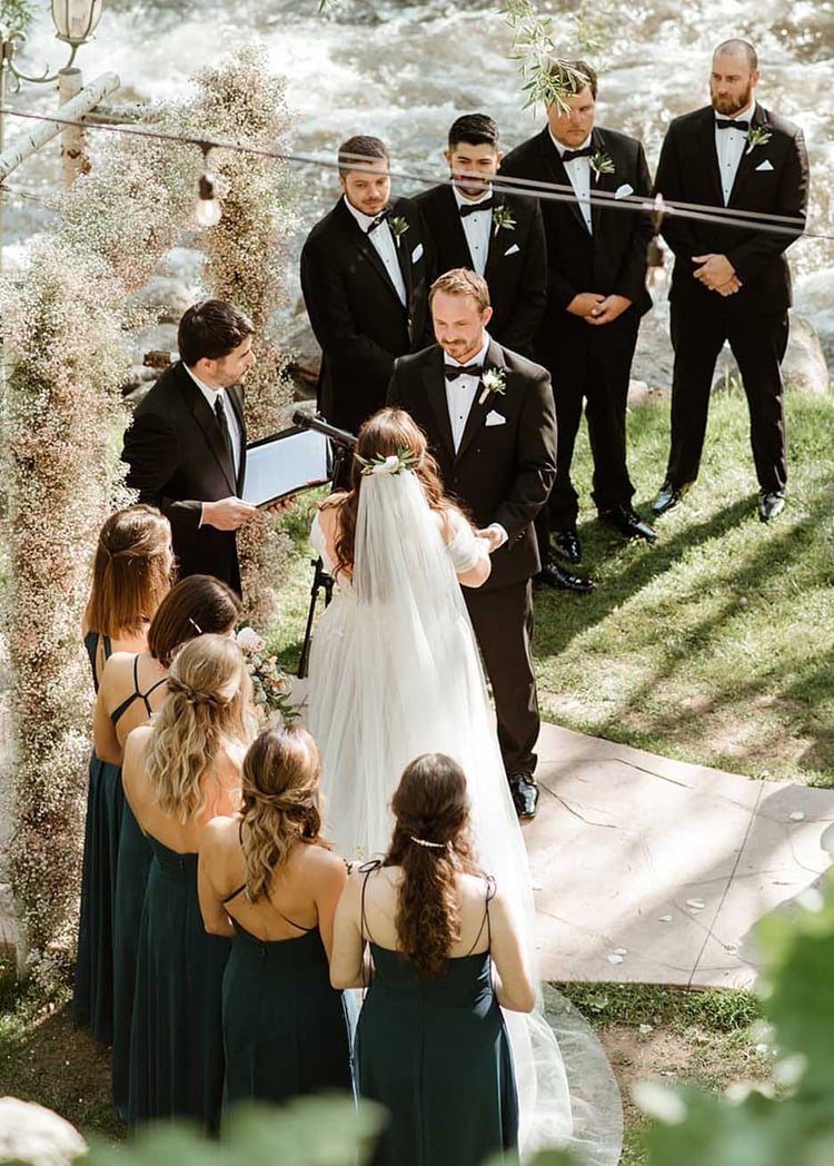 What do you envision when you imagine a romantic celebration of love in the woods alongside a babbling creek? Chances are it'll look something like this beautiful wedding at Boulder Creek by Wedgewood Weddings. Think secret-garden vibes, romantic nature-inspired color palette, lavish greenery, roses, and wandering wildlife. Oh, and dinosaurs! Join us for a virtual tour of Katie and Robert's wedding story . . .