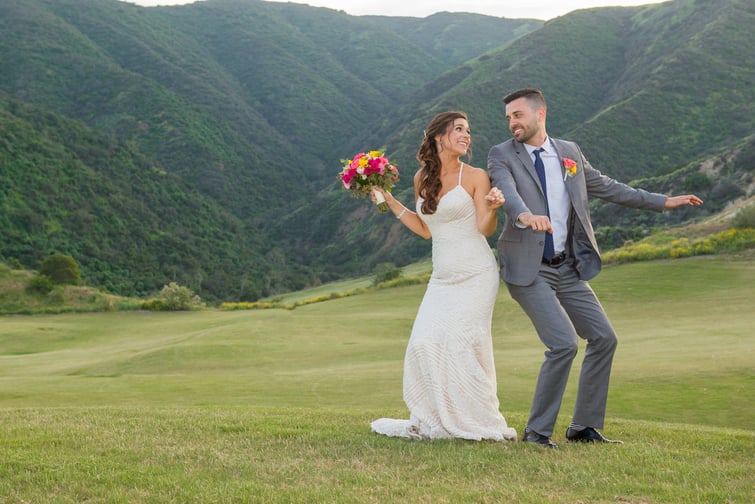 Happy newlyweds celebrate their wedding at The Retreat by Wedgewood Weddings