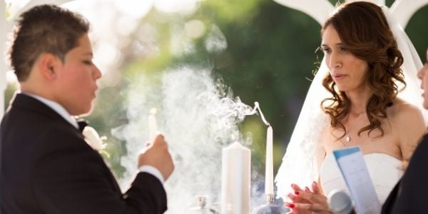 The lighting of the unity candle is one of the most common traditions in both religious and non-religious ceremonies. During the unity candle ceremony, the couple takes small lit candles and together they light the unity candle. The flame symbolizes the light of two people to ignite one life together.