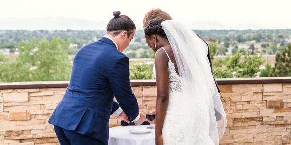 Everyone loves a good toast at a wedding, so why not toast with wine that the couple has blended? During this unity ceremony, the couple pours their choice of red and white wine into one wine carafe to represent the merging of two souls. The couple will then serve themselves a glass of the new blend to share with each other, and possibly their guests.