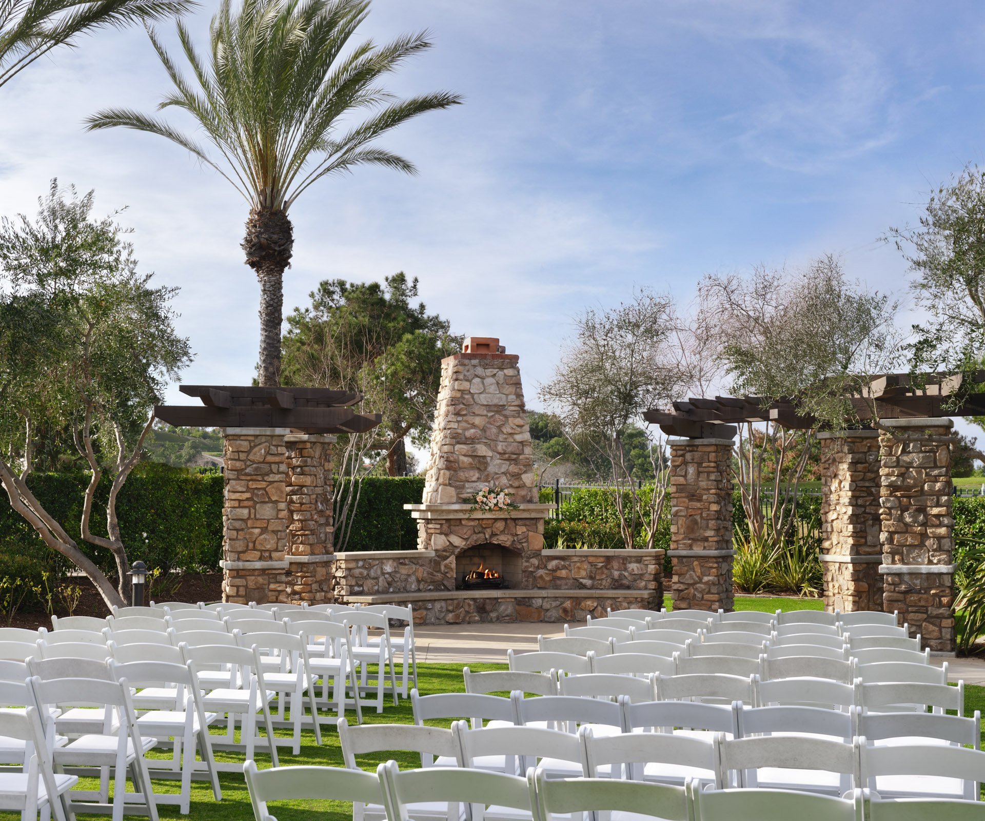 Scenic golf course wedding venue in Southern California featuring multiple ceremony sites, an outdoor patio, and a spacious ballroom.