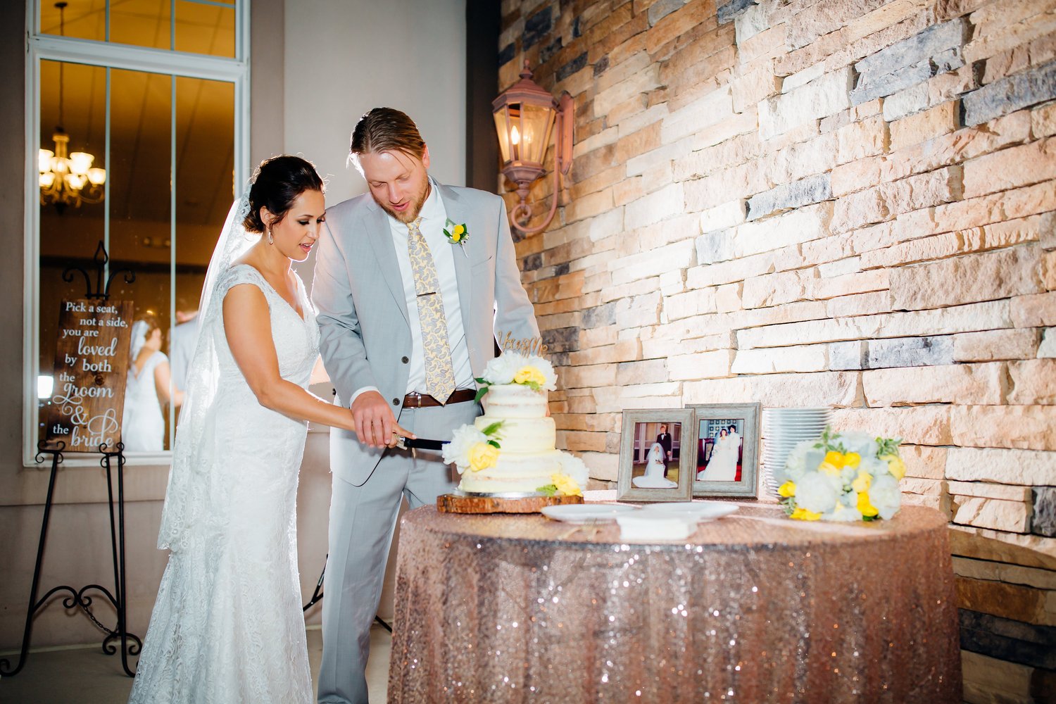 Cake cutting at Ken Caryl Vista by Wedgewood Weddings