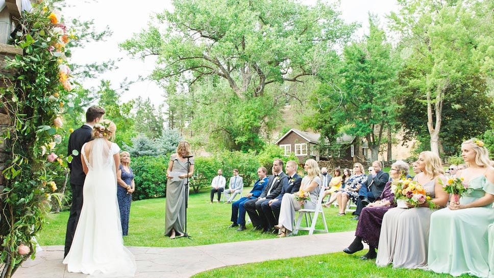 Social distancing seating arrangements during an outdoor wedding ceremony at Boulder Creek