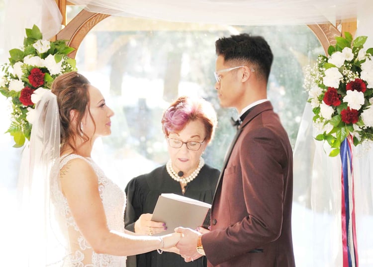 jesse and julia share heart-felt vows with a snowy backdrop