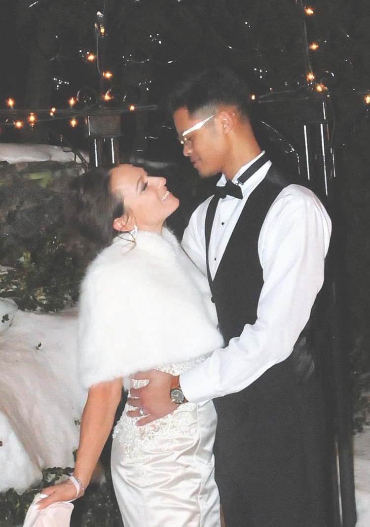 Julia and Jesse end the night with one last portrait against the glistening snow