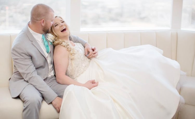 Happy Newlyweds In The Sky Lounge at Pacific View Tower