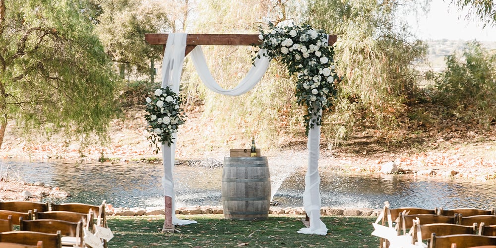 Arch with wine barrel - Galway Downs by Wedgewood Weddings