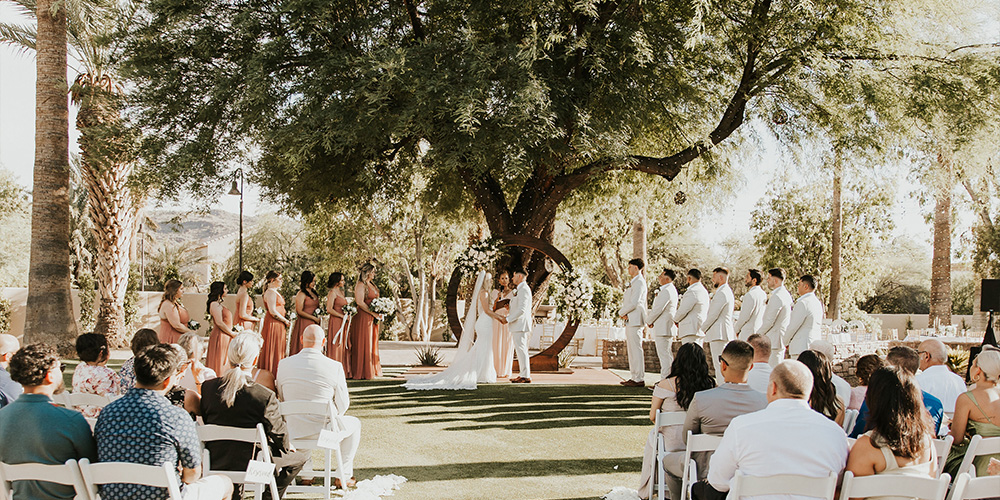 Ceremony at Secret Garden by Wedgewood Weddings