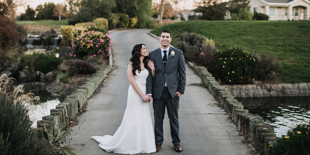 Couple by pond at Brentwood Rise by Wedgewood Weddings