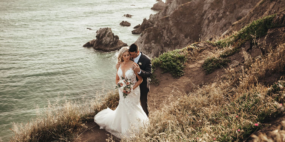 Couple in cliffs at beach