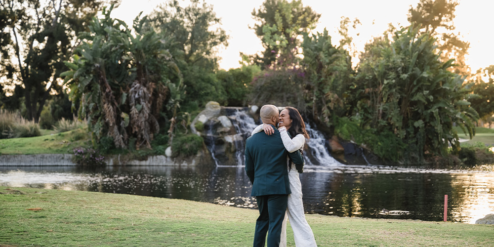 Couple in front of pond - Rio Hondo by Wedgewood Weddings