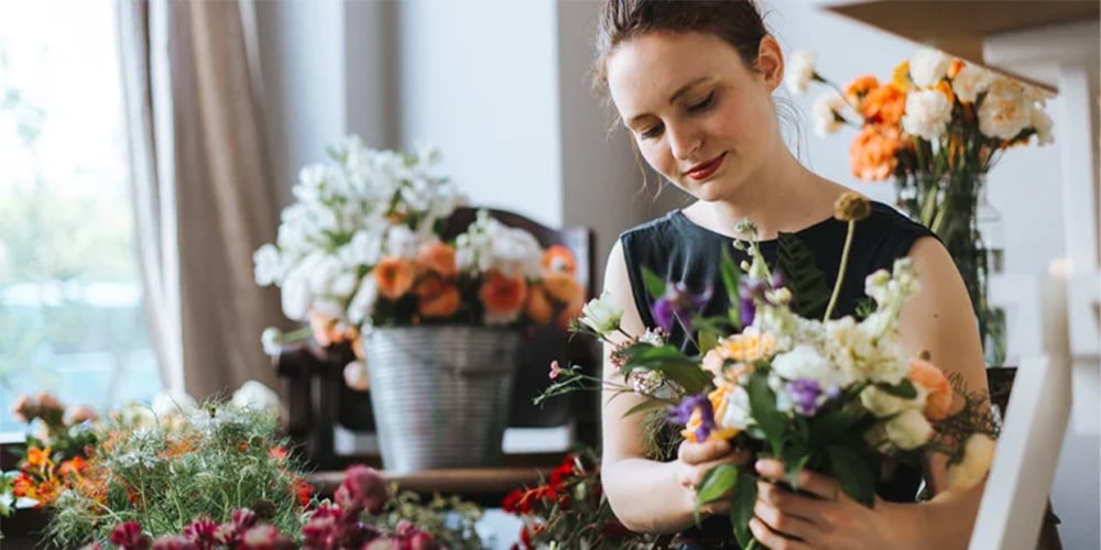 Florist arranging flowers