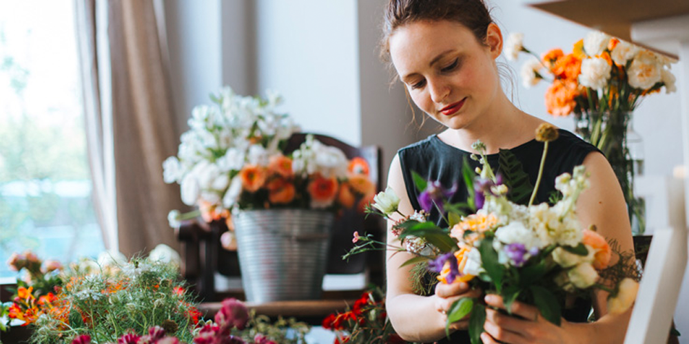 florist assembling flowers