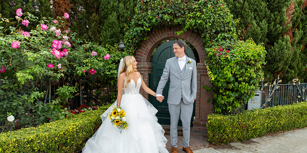 Bride and groom with lots of greenery - Cuvier Club