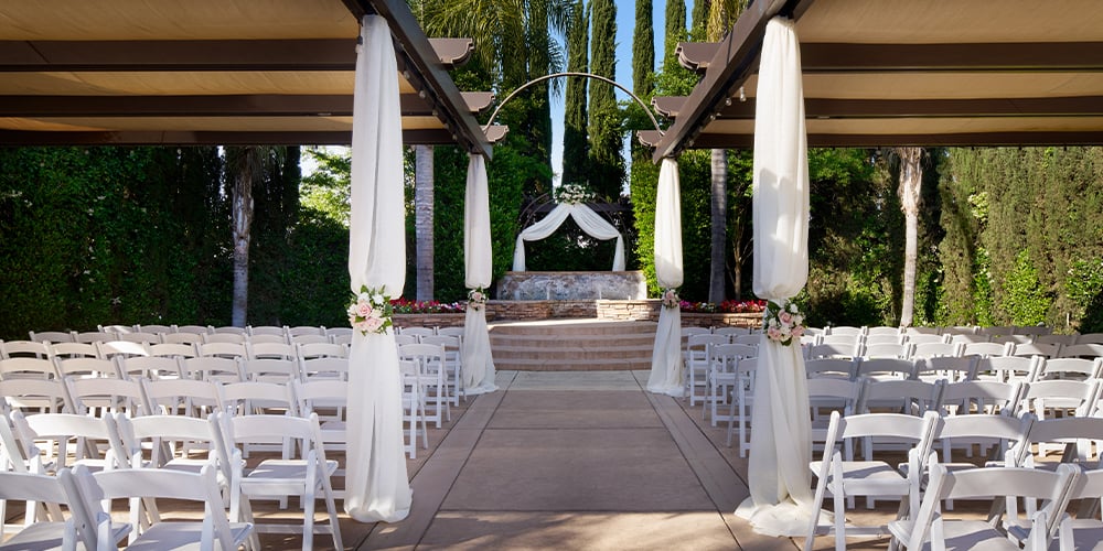 Wedgewood Weddings Fresno Fields outdoor garden ceremony space with landscaped grounds and open-air seating