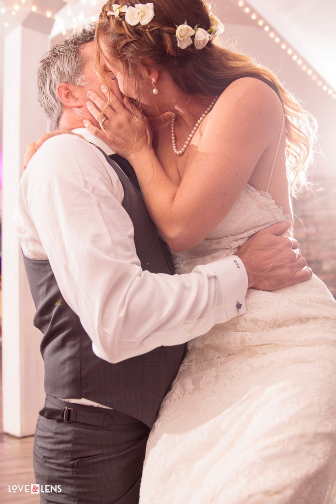 Wedge Weddings couple kissing