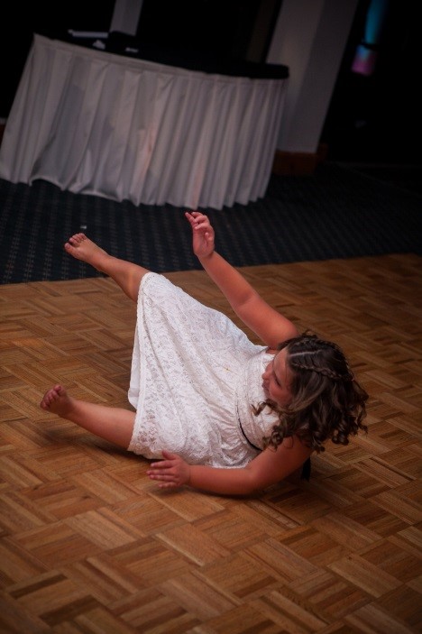 girl falling over on dancefloor
