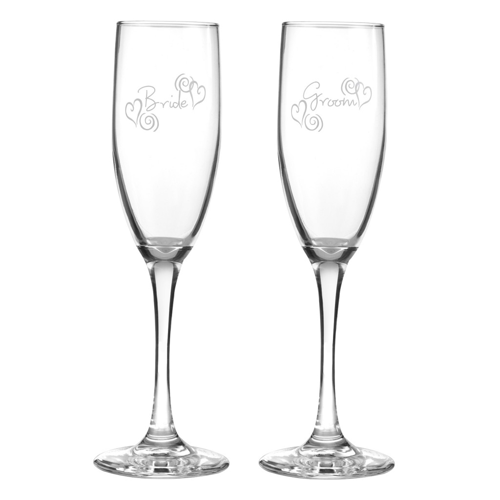 bride and groom toasting champagne glasses