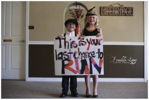 flower girl and ring bearer sign this is your last chance to run