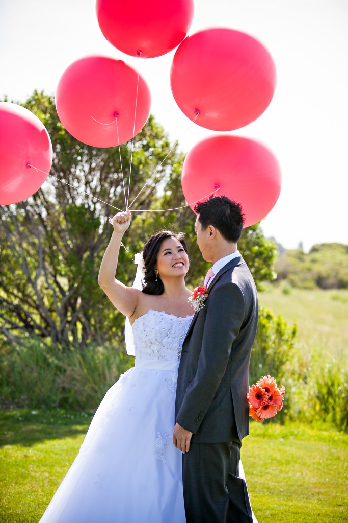 Wedgewood Weddings bride and groom with balloons