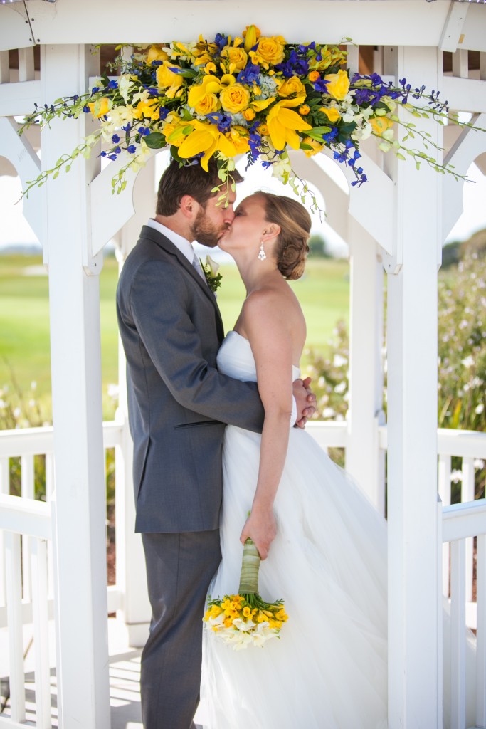 yellow wedding color scheme ceremony arch