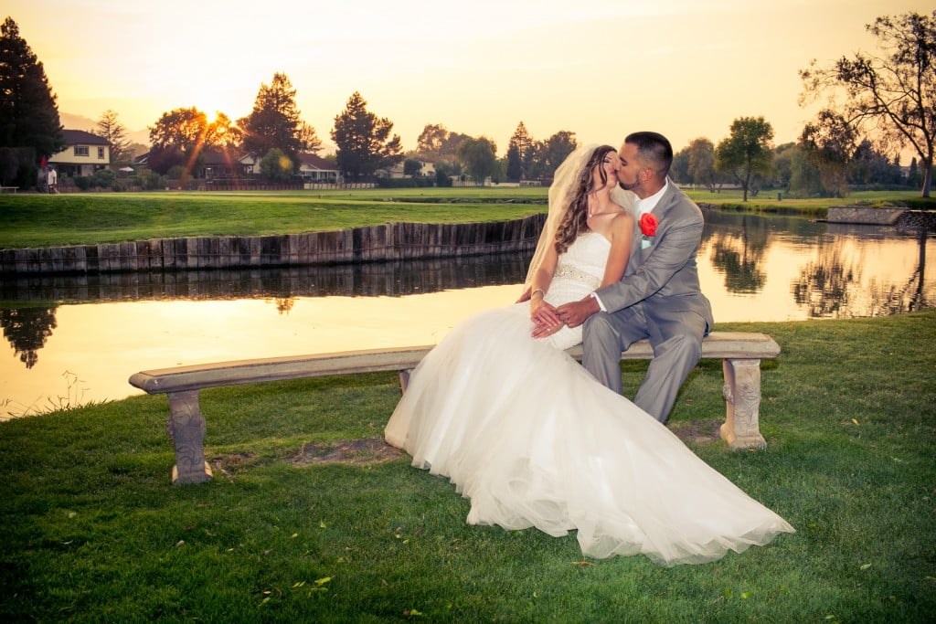 An intimate moment shared by the lake at San Ramon by Wedgewood Weddings