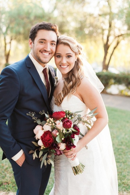 bride and groom photo with gorgeous wedding bouquet