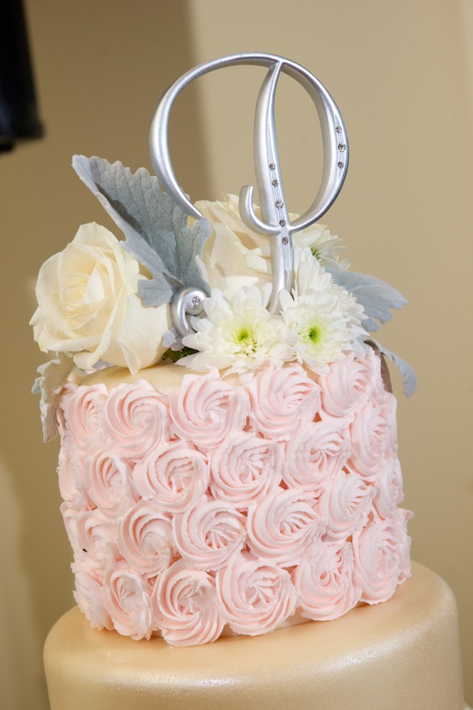 beautiful silver initial wedding cake topper