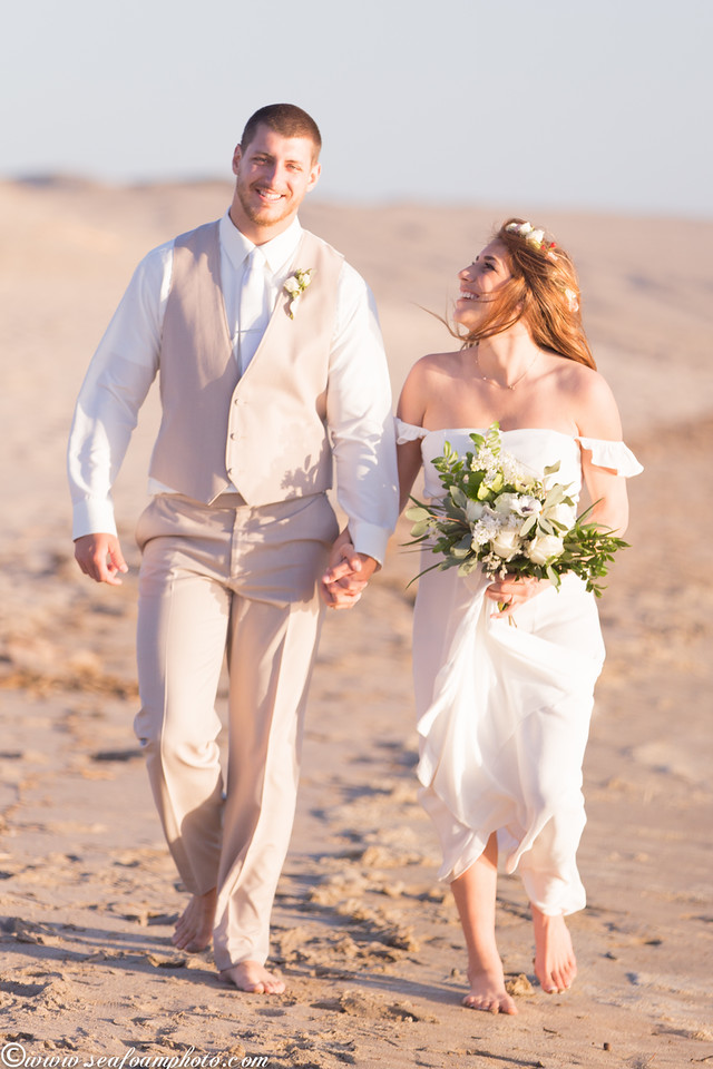 bride and groom running on beach - Wedgewood Weddings