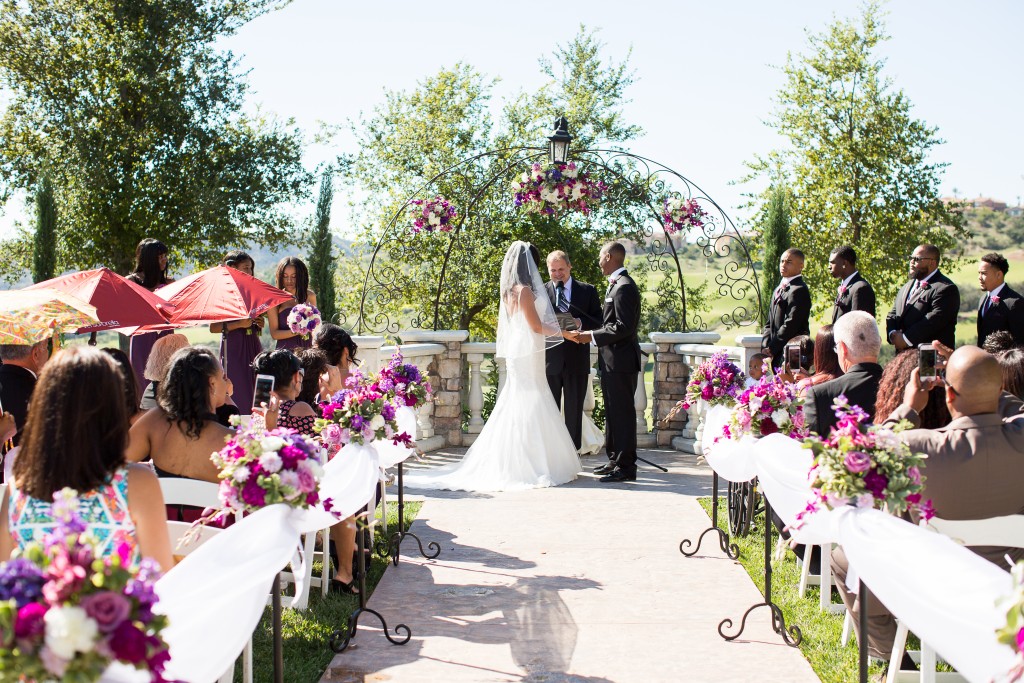 purple wedding color scheme ceremony arch